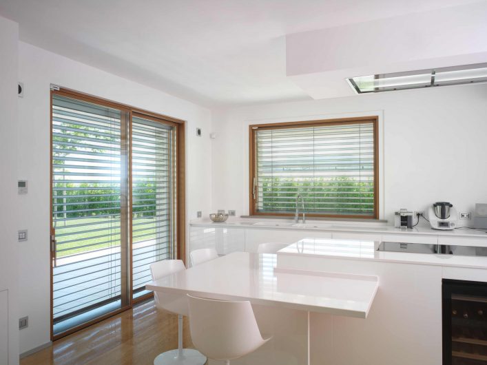 View of the windows in the kitchen with aluminium brise soleil